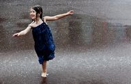 Kids Dancing In The Rain Photography