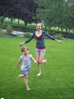 Kids Dancing In The Rain Photography
