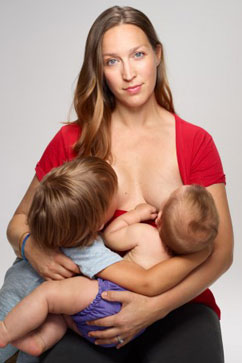 Woman Breast Feeding Man