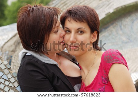 Women Kiss Women And Touching